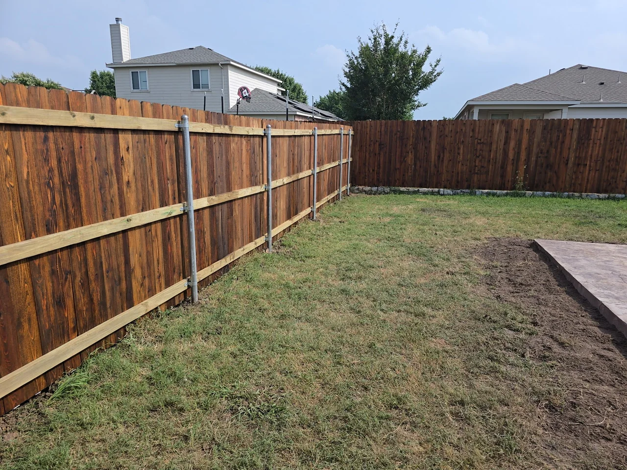 Stained cedar privacy fence