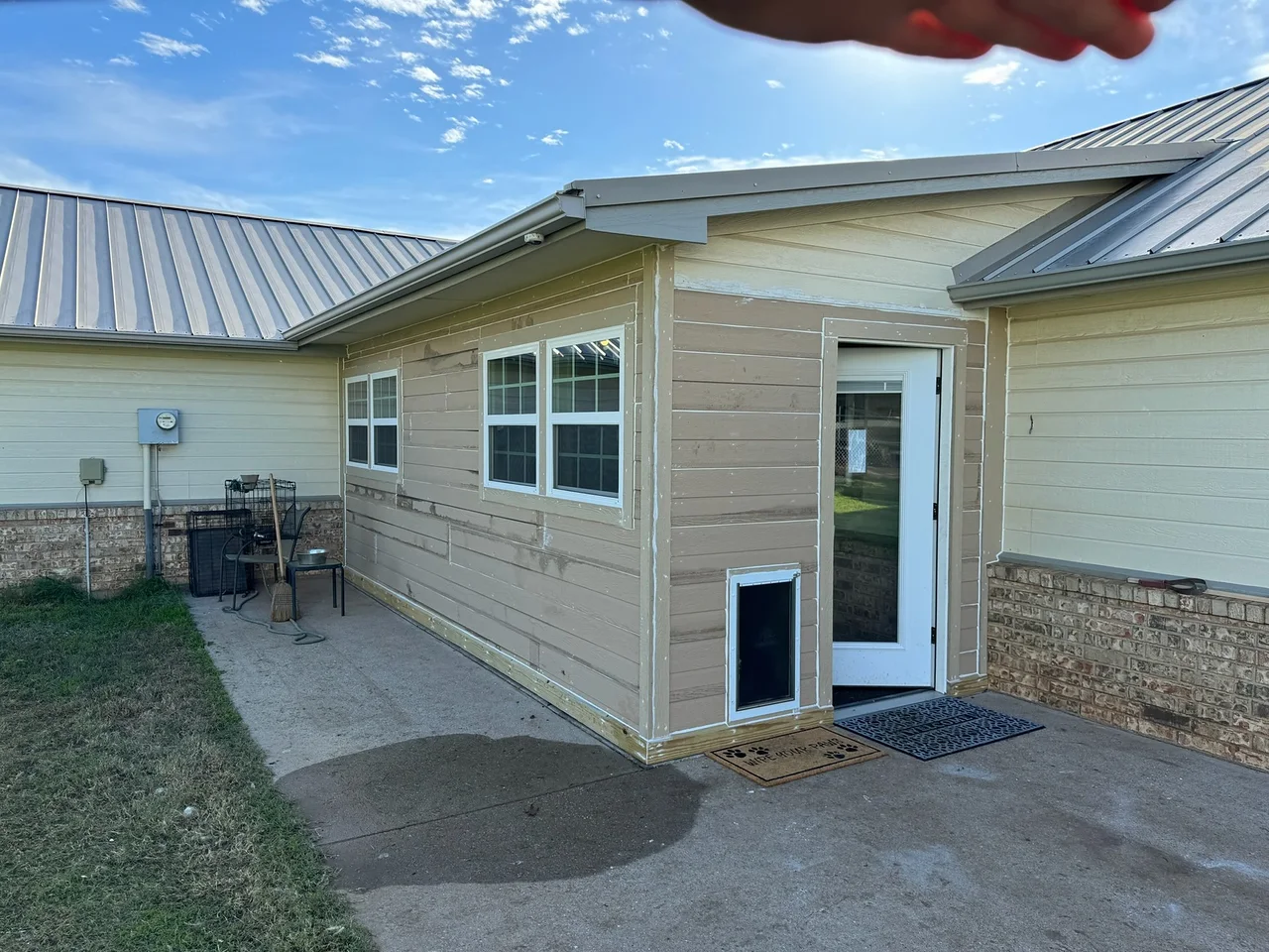 Room addition with new siding