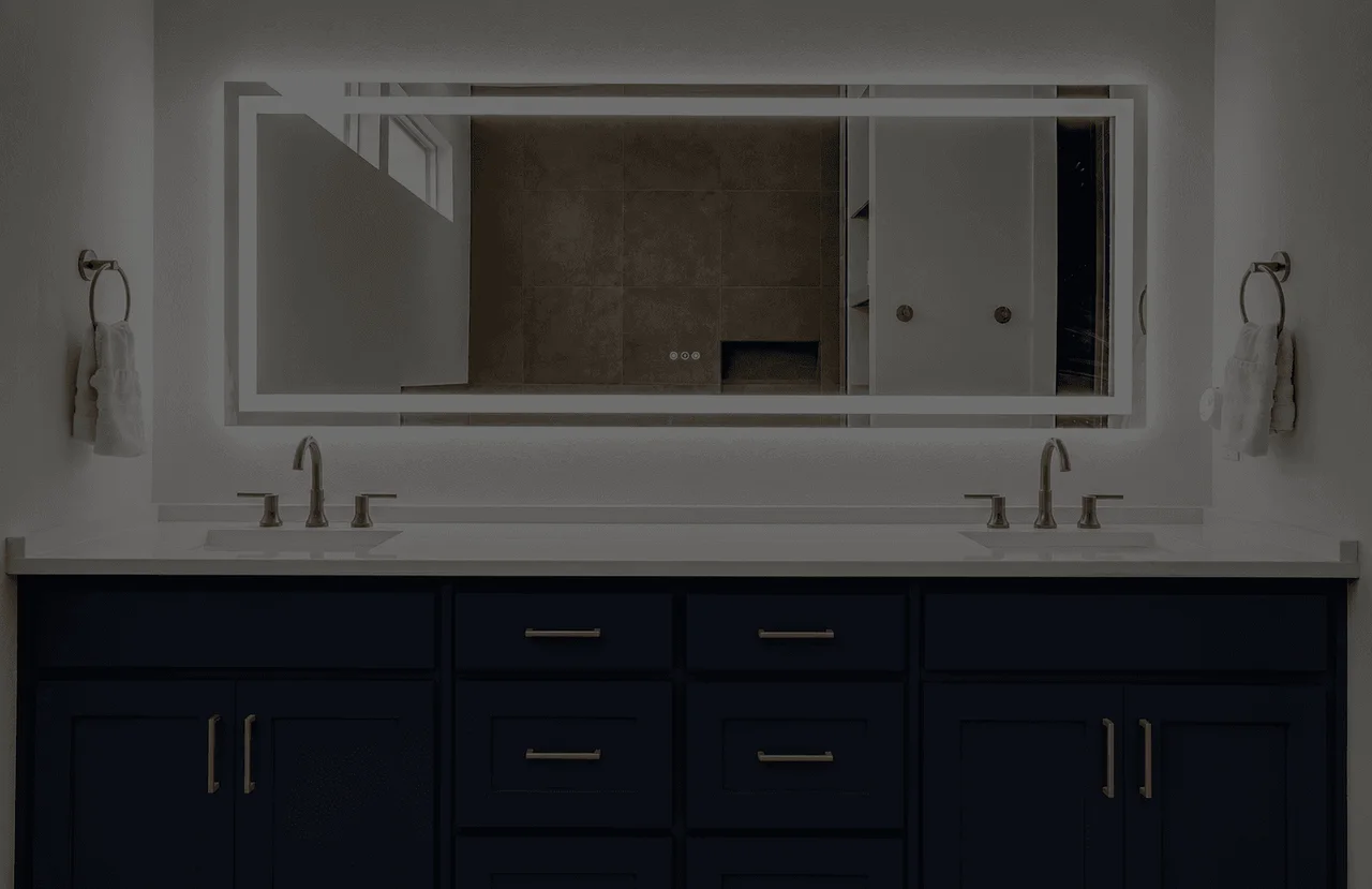 Navy double vanity with backlit mirror